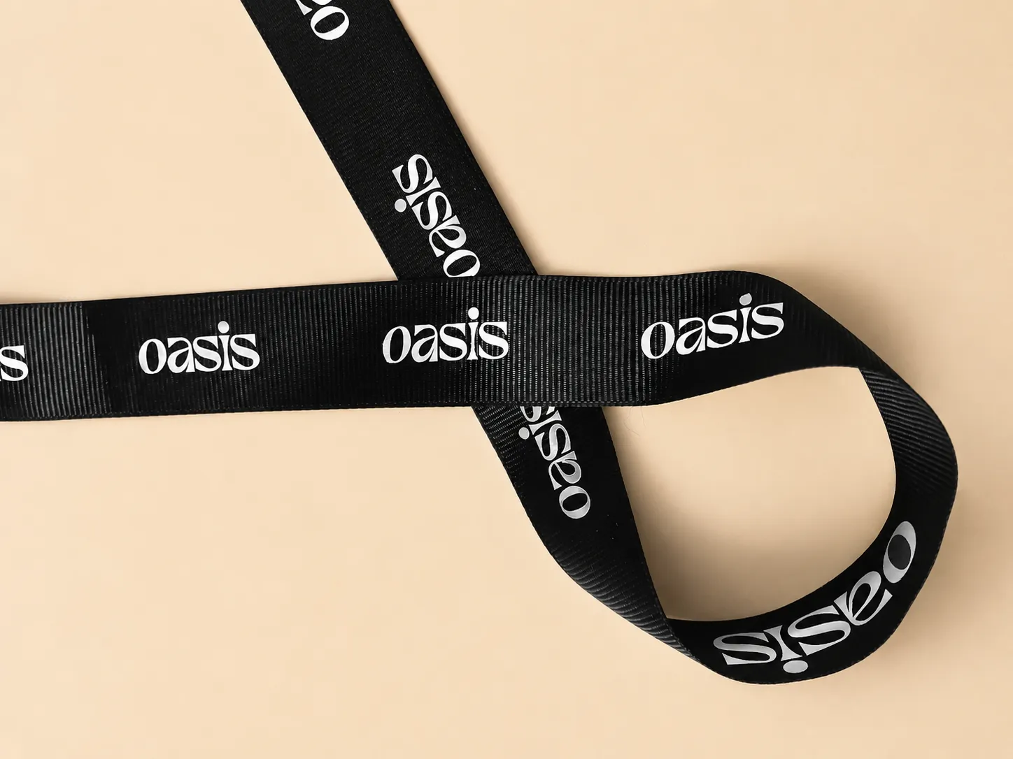 Printed branded ribbon used in a fashion packaging system