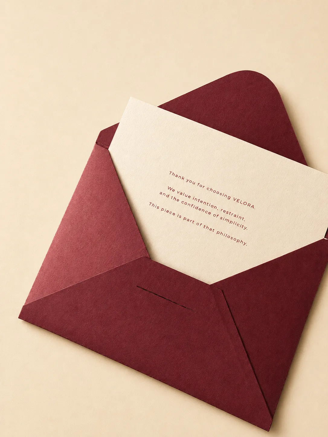 Branded thank-you card and envelope for a fashion label