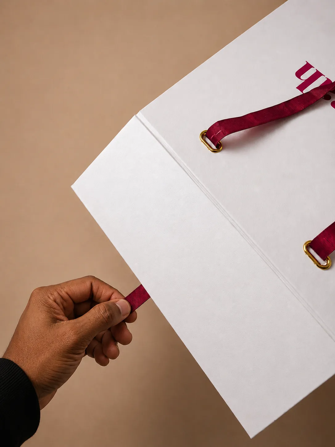 Branded thank-you card and envelope for a fashion label